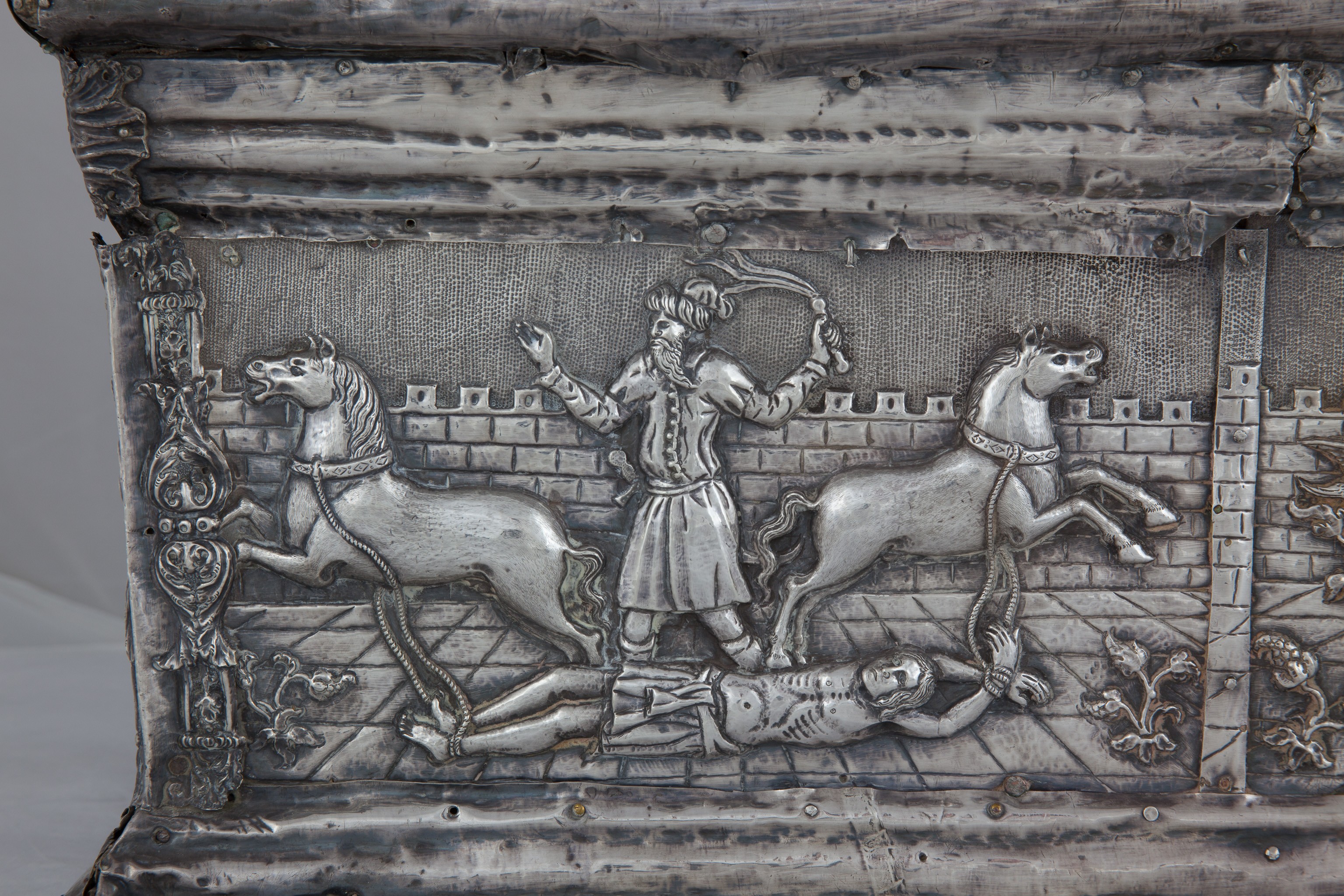 Detail of St. Tryphon drawn and quartered by horses, Reliquary Casket of St. Tryphon, ca. 1539, Cathedral of St. Tryphon, Kotor (source: S. Kordić)