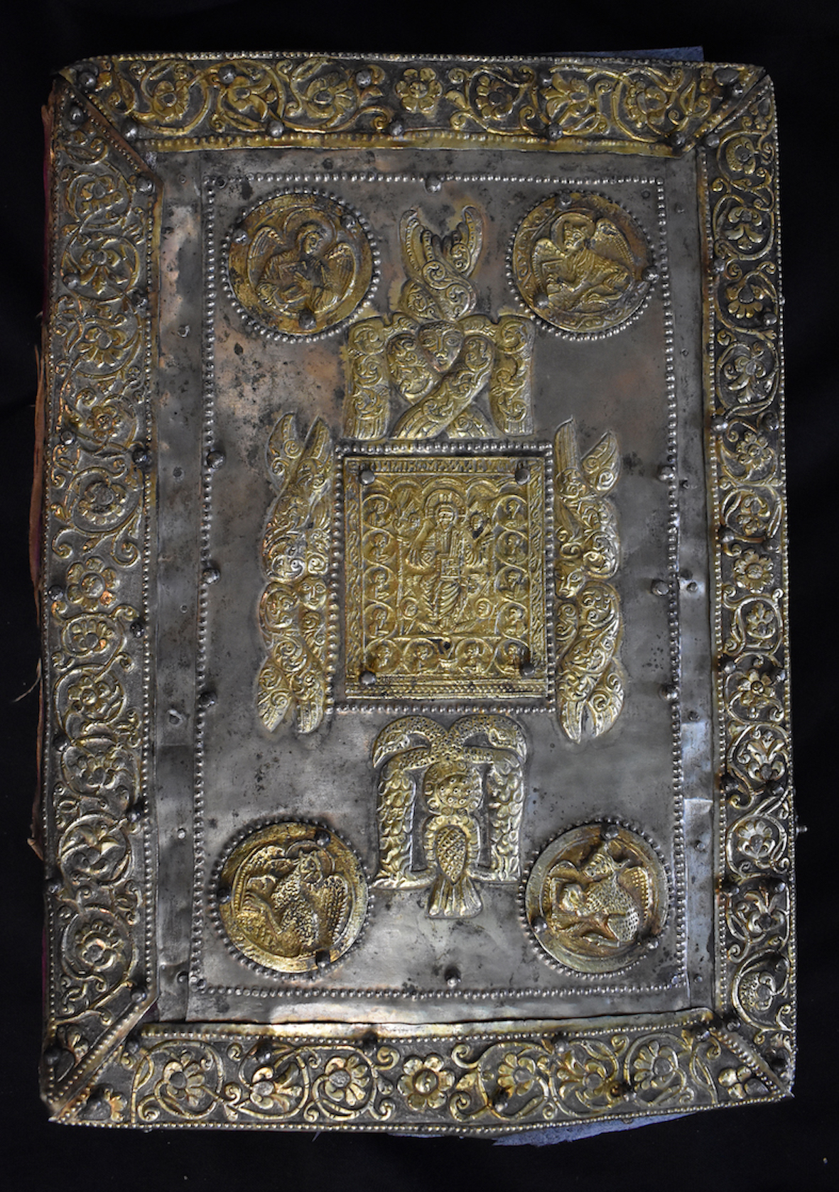 Back cover of Gospel book by the goldsmith Dimos, 1673, front cover; wooden board, velvet, metallic plaques and stripes, partly gilt, enamel, repoussé, filigree, Church of St Nicholas, Metaxochori, Aghia, Thessaly) (source: project «Ecclesiastical Silver: Study and Documentation using Non-Destructive Techniques of Ecclesiastic Plate in Magnesia and Larissa Districts (15th - 19th centuries)» (MIS 5005968), Y. Varalis and C. Dolmas)